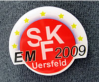 EM2009 Anstecker